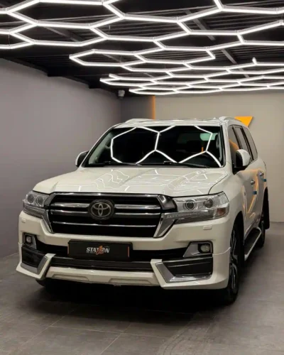 Land Cruiser white 00325-side-Station One Autos Dubai
