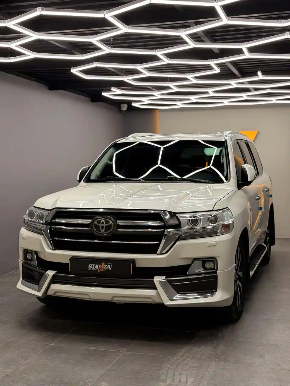 Land Cruiser white 00325-side-Station One Autos Dubai