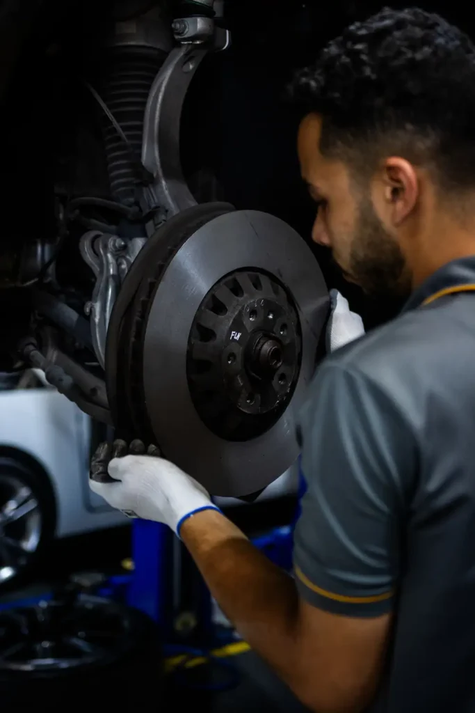 Car brake disc inspection before rotor replacement